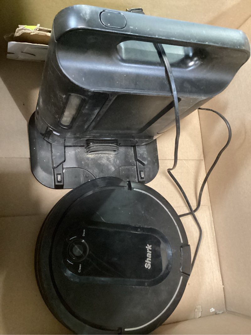 Condition photo showing As Is for Shark Matrix Plus Robot Vacuum and Mop with Self-Empty HEPA Base, Sonic Mopping, Matrix Clean, Home Mapping, HEPA Bagless Self Empty Base, CleanEdge, for Pet Hair, UR2650WS Wet and Dry Self-Empty (Black) (similar product)