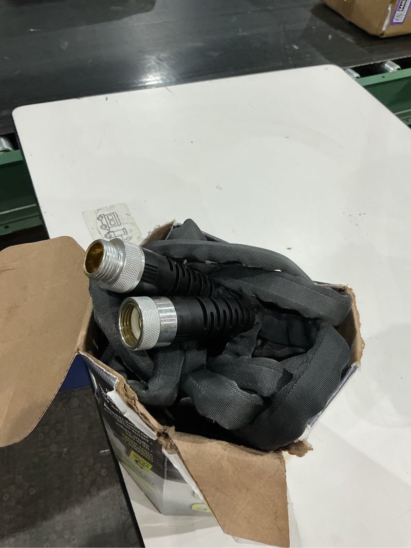 Condition photo showing As Is for teknor apex zero-g 5/8 in. d x 50 ft. l heavy duty commercial grade garden hose