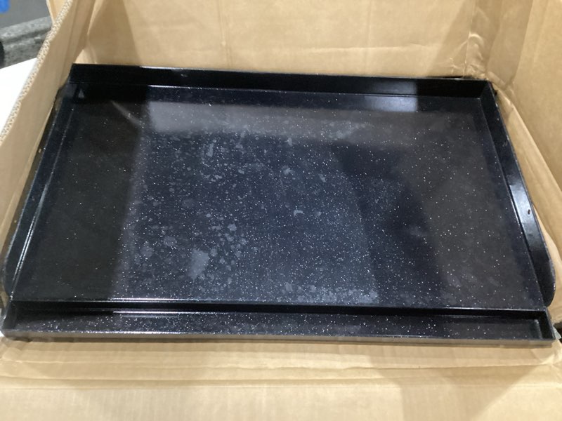 Condition photo showing As Is for universal 25" x 16" nano-ceramic nonstick coating grill griddle for gas grill, cast iron griddle for charcoal, gas grills, camping, flat top plate insert with grease groove and removable handles 26.2" x 16.5" x 4.1"