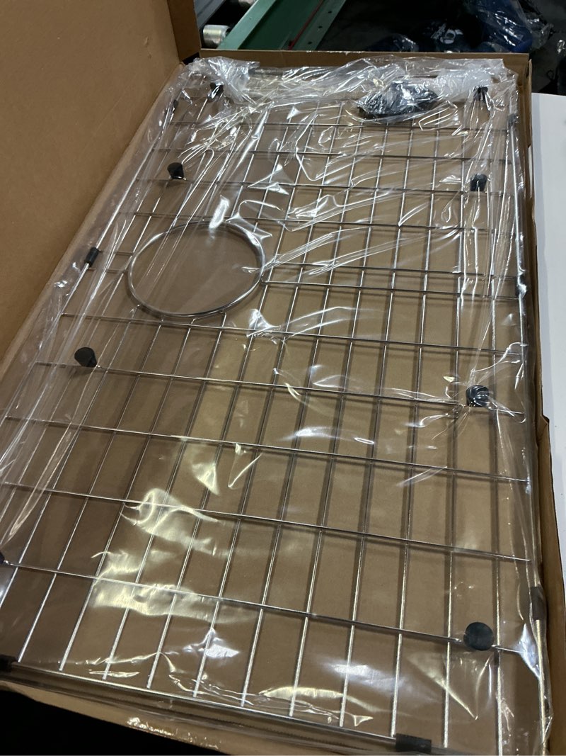 Condition photo showing Good Condition for serene valley 29-5/16" x 16-3/8" sink bottom grid, rear drain with corner radius 3/16", sink grids stainless steel nlw3017r