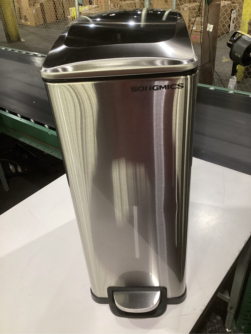 Condition photo showing As Is for songmics slim trash can, 13-gallon (50 l) garbage can for narrow spaces with soft-close lid, inner bucket, and step-on pedal, stainless steel, 15 trash bags included, silver ultb510e48 13 gal. silver