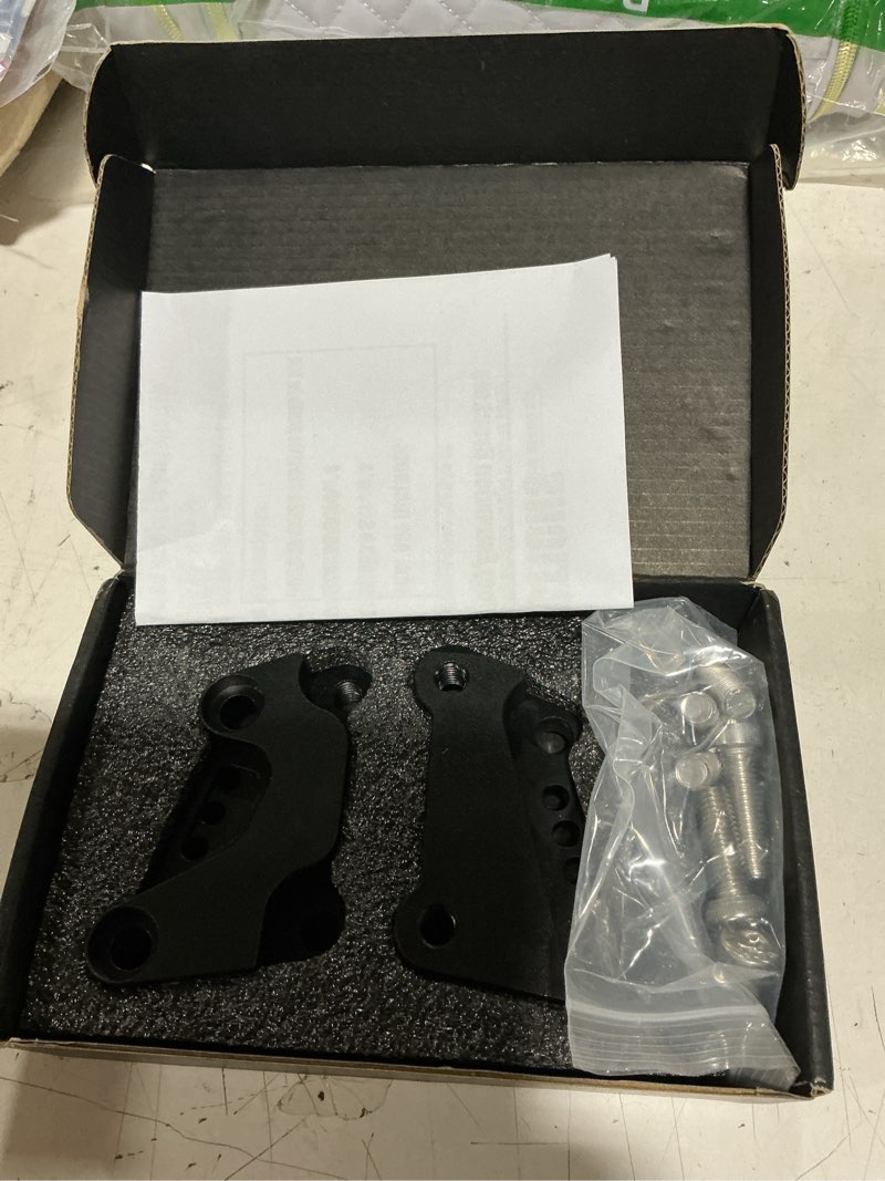 Condition photo showing New/Like New for brake caliper extension brackets 13" rotors for harley bagger, touring, street glide, road king, electra glide, road glide, 2008-2024 (left & right)