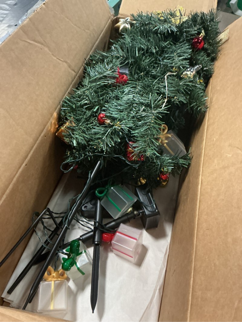 Condition photo showing As Is for 2 Pack Solar Mini Christmas Tree Decorations Lights, 30 Inch 8 Flashing Modes Waterproof Xmas Decor, 60 LED Lights with Ornaments 6 Lighted Gift Boxes for Porch Pathway Yard Garden (Warm White)