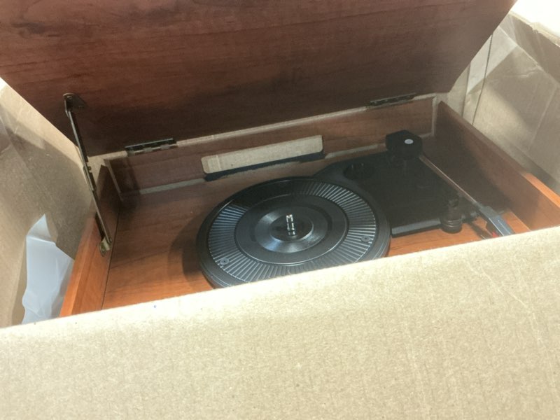 Condition photo showing As Is for bluetooth record player 10 in 1, 3-speed turntable for vinyl with speakers, lp to mp3 converter, cd, cassette player, fm radio, wireless streaming | mahogany