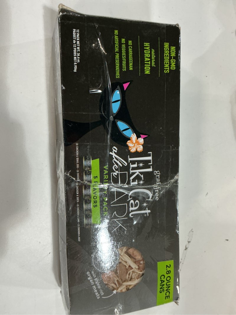 Condition photo showing New/Like New for Tiki Cat After Dark, Variety Pack, High-Protein and 100% Non-GMO Ingredients, Wet Cat Food for Adult Cats, 2.8 oz. Cans (Pack of 12) 2.8 Ounce (Pack of 12) (BEST BY 07/2028)