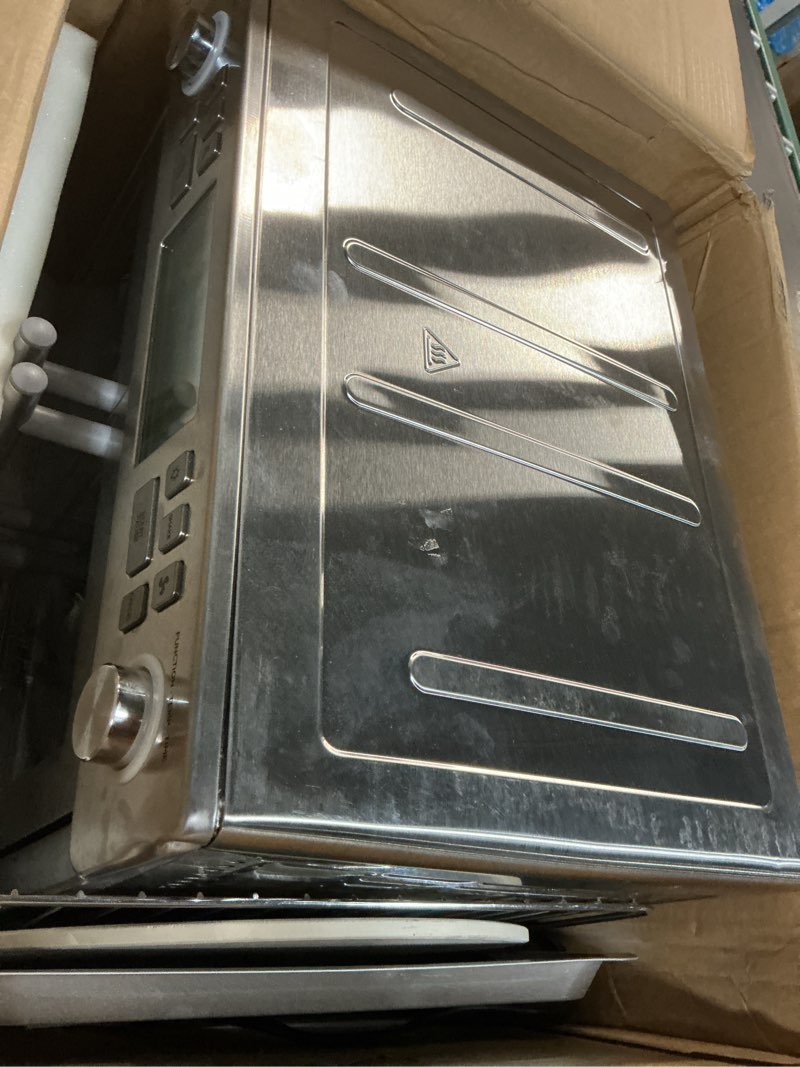 Condition photo showing Good Condition for emeril lagasse dual zone 360 air fryer oven combo with french door, 25 qt extra large, cook two foods in different ways, up to 60% faster from frozen to finish, pizza stone accessory dual zone + pizza stone