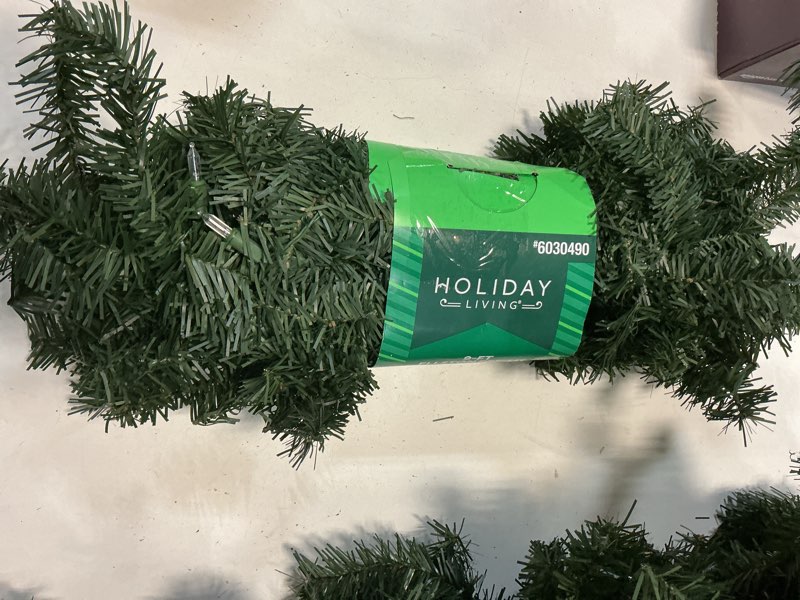 Condition photo showing As Is for Northlight Indoor/Outdoor Pre-lit Electrical outlet 9-ft Pine Artificial Garland with White Incandescent