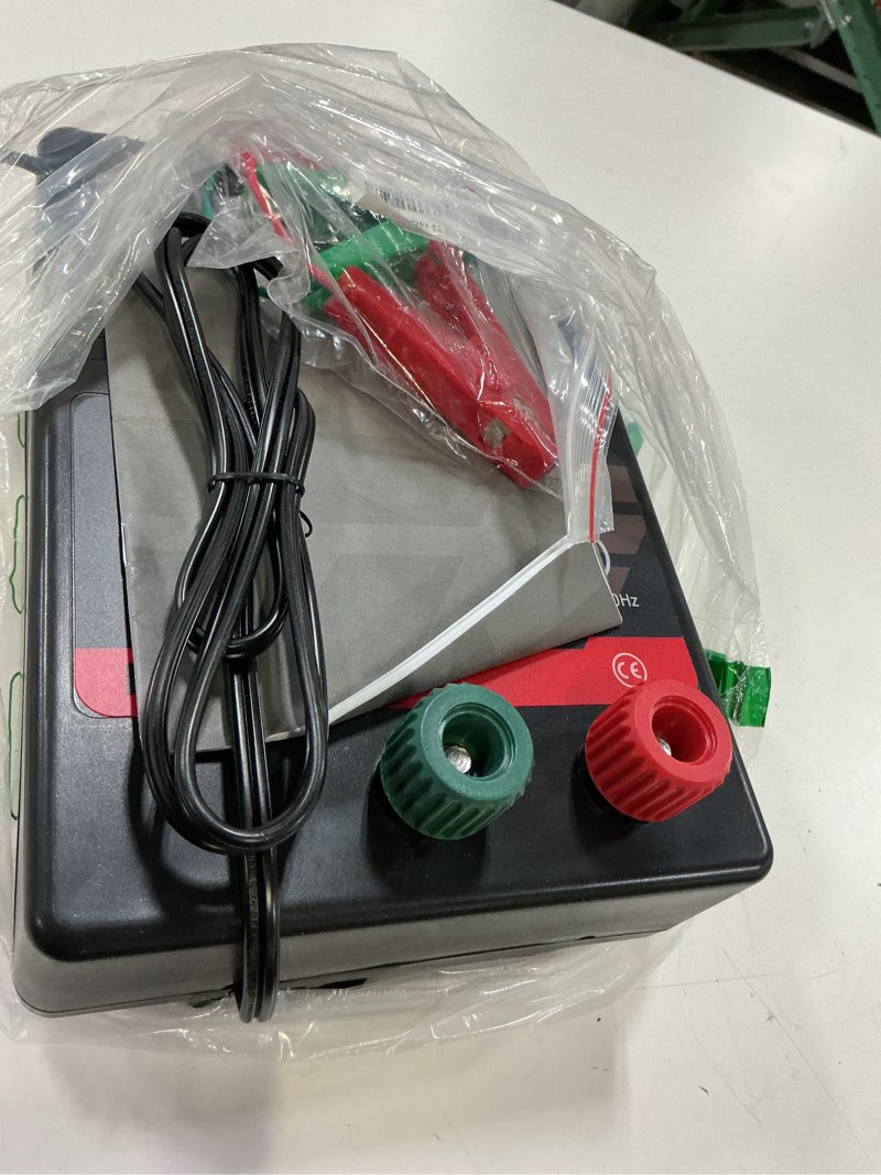 Condition photo showing As Is for electric fence charger ac powered 110 miles, 110 volt 10 joule plug-in electric fence energizer, output voltage max 11.3 kv for livestock, preventing predators from intruding