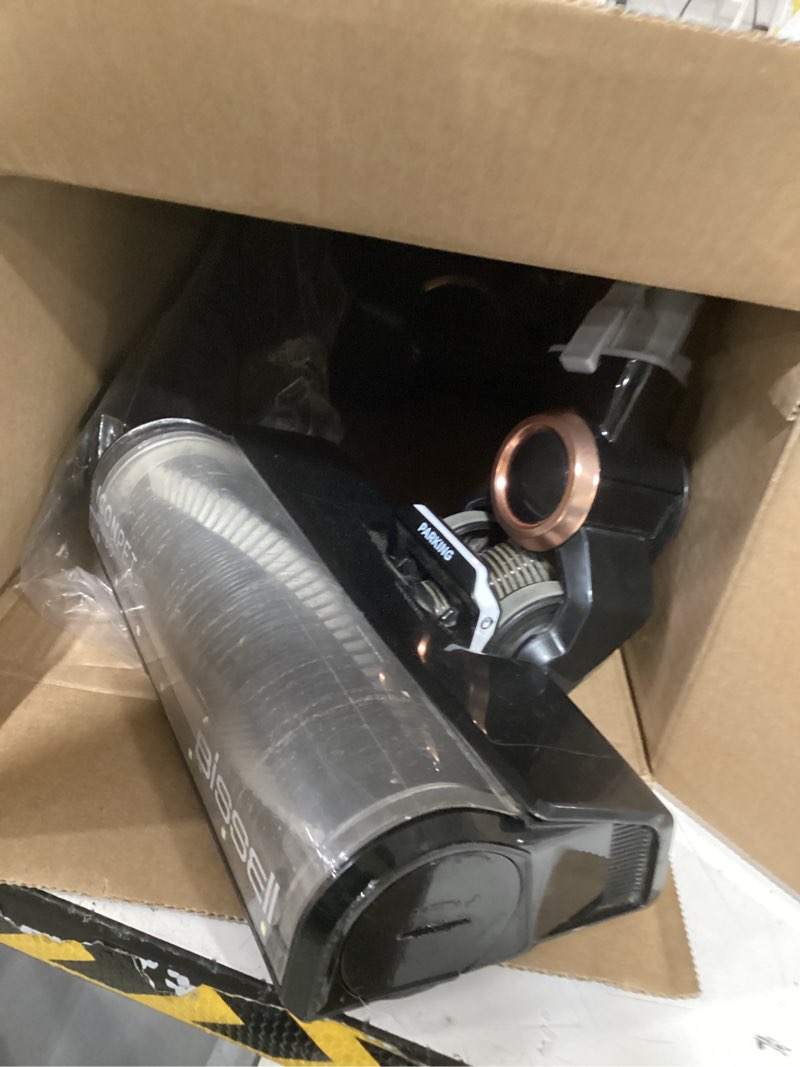 Condition photo showing As Is for bissell iconpet turbo vacuum with powerful turbo boost suction, tangle free brush roll, & parking break, led crevice + dusting brush tool, led motorized turbobrush tool, & wall mount. color may vary 31781