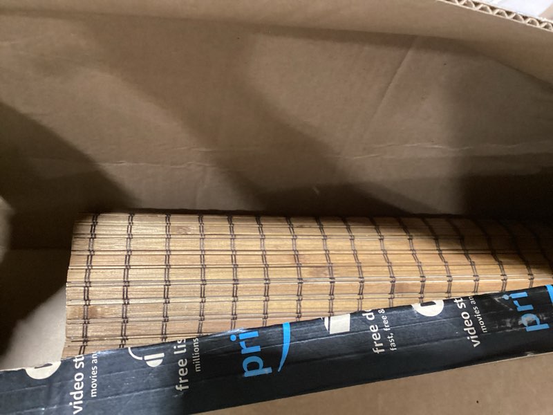 Condition photo showing Good Condition for unishades cordless bamboo roman shades for windows, 100% blackout backing fabric for light blocking, 20" w × 64" h - penang teak blackout - penang teak 20" w × 64" h