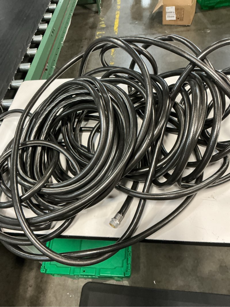 Condition photo showing As Is for neverkink teknor apex 5/8-in x 125-ft heavy-duty kink free vinyl green coiled hose