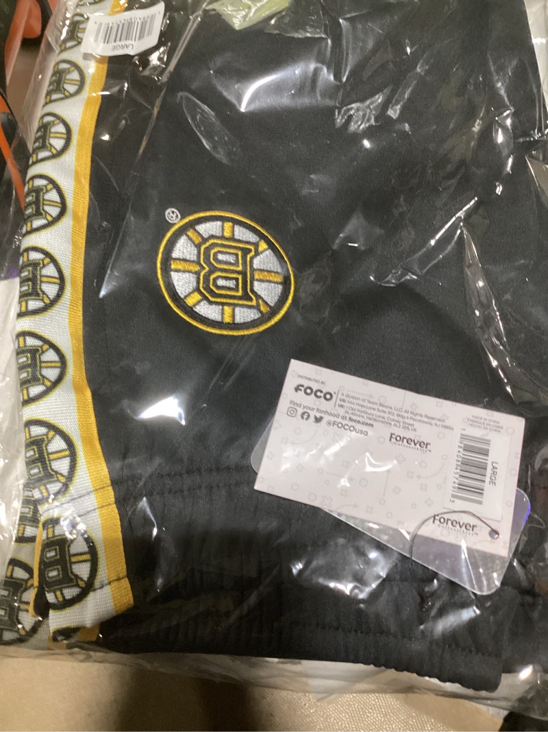 Condition photo showing New/Like New for FOCO Men's NHL Team Color Stripe Logo Track Suit Pants Boston Bruins Large Team Color