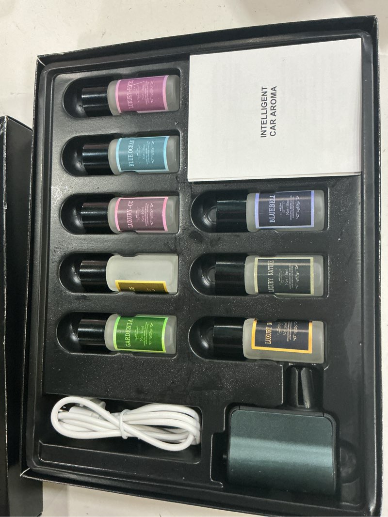 Condition photo showing As Is for car air freshener diffuser,smart car aroma diffuser air freshener spray automatic with 10pcs cologne aromatherapy oil (grey)