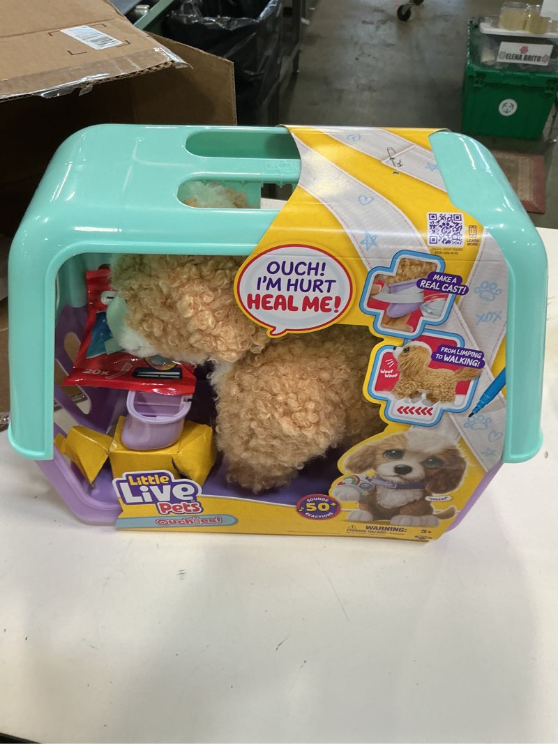Condition photo showing New/Like New for Little Live Pets Ouchies Amazon Exclusive Hazel The Poodle Plush, 50+ Sounds, Limping to Walking Puppy Toy & Carrier, Interactive Toy Dog for Kids 5+