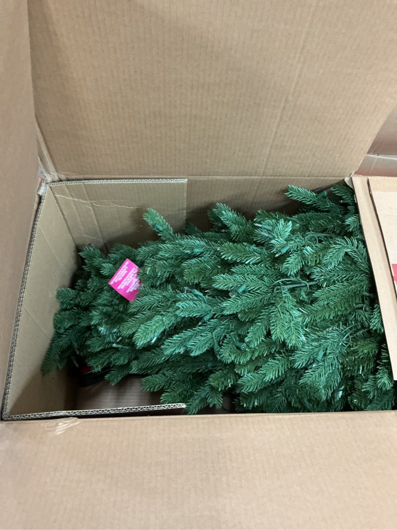 Condition photo showing New/Like New for National Tree Company 7.5 ft Pre-Lit Jersey Fraser Fir Artificial Christmas Tree, 1,250 Clear Lights, 3,144 Tips, Includes Stand, Green 7ft 6in