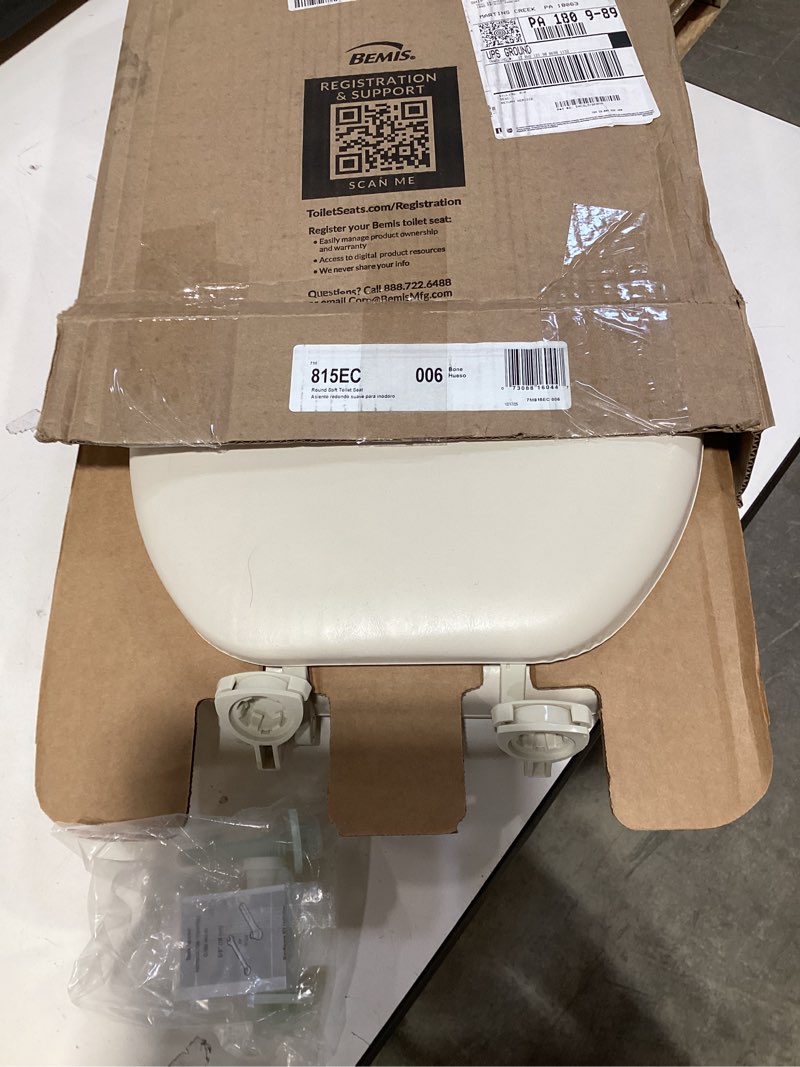 Condition photo showing Good Condition for mayfair padded toilet seat, cushioned soft vinyl over wood core seat, secure hinges, easy clean, made in usa, round, bone