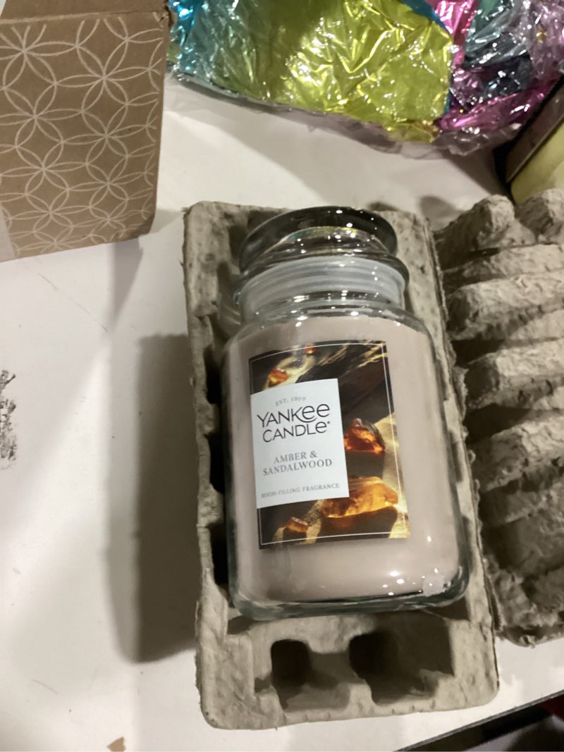 Condition photo showing New/Like New for Yankee Candle Amber & Sandalwood, Scented Candle, 22oz Large Jar with up to 150 Hour Burn Time, Giftable