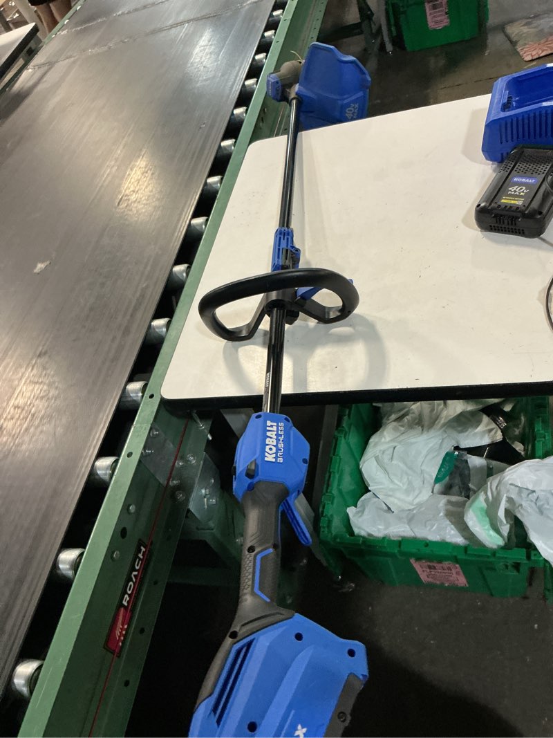 Condition photo showing As Is for kobalt gen4 40-volt 15-in straight shaft attachment capable battery string trimmer edger conversion capable 4.0 ah (battery included) (charger included)