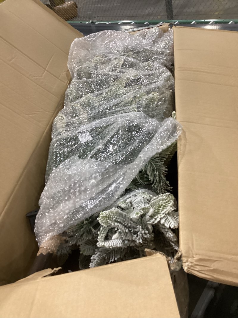 Condition photo showing As Is for Puleo International 6.5ft Pre-Lit Slim Flocked Aspen Fir Christmas Tree with 350 Clear Lights, 760 Realistic Dense Snow Flocked Branch Tips, Easy Setup Artificial Trees with Sturdy Metal Stand 6.5' Slim Flocked Aspen Fir with 350 Clear Lights Christmas Tree