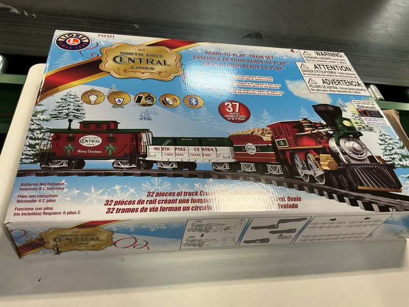 Condition photo showing New/Like New for Lionel Battery-Operated North Pole Central Freight Toy Train Set with Bluetooth, Locomotive, Train Cars, & Track with Authentic Train Sounds, Lights, & Water Vapor Smoke Effects for Kids 4+