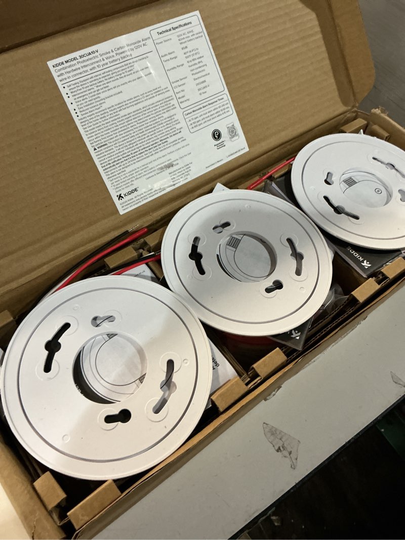 Condition photo showing As Is for Kidde Hardwired Smoke & Carbon Monoxide Detector for Home, Voice Alerts, 10-Year Battery Backup, 3-Pack 3 Pack