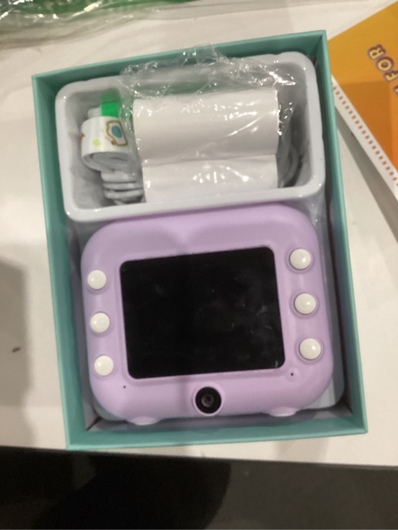 Condition photo showing Good Condition for Instant Camera, Front Rear Dual Selfie Kids Camera with 1080P Videos, Holiday Birthday Gifts for Kids Age 3-12, Toddler Portable Travel Print Digital Camera Toy for 4 5 6 7 8 9 Year Boys Girls Purple