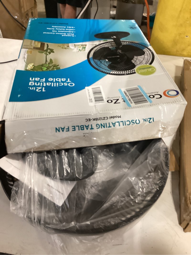 Condition photo showing Good Condition for comfort zone oscillating table fan with adjustable tilt, convenient push button controls, quiet, 12 inch, 3 speed, desk fan, airflow 7.25 ft/sec, ideal for home, bedroom, dorm & office, cz121bk black