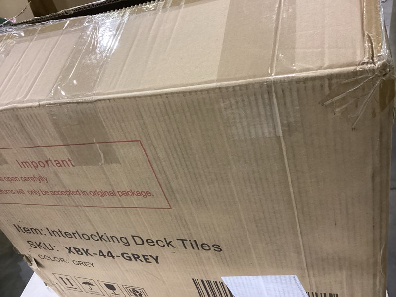 Interlocking deck tiles 