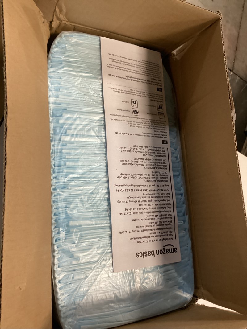 Condition photo showing New/Like New for Amazon Basics Dog and Puppy Pee Pads, 5-Layer Leak-Proof Super Absorbent, Quick-Dry Surface, Potty Training, Regular (22x22"), 100 Count, Blue & White Regular (100 Count)