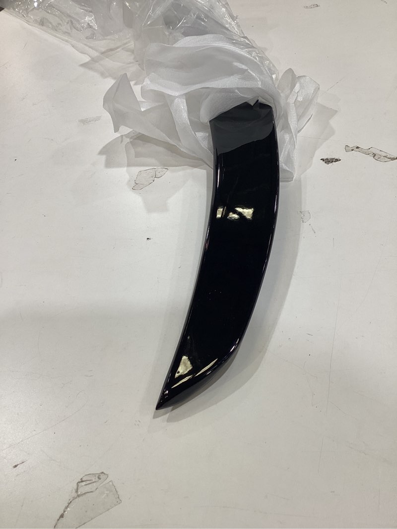 Condition photo showing As Is for car part, black