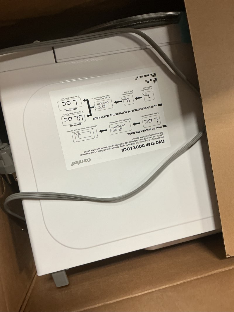 Condition photo showing As Is for COMFEE' EM720CPL-PM Countertop Microwave Oven with Sound On/Off, ECO Mode and Easy One-Touch Buttons, 0.7 Cu Ft/700W, Pearl White 0.7 Cu.Ft Classic White