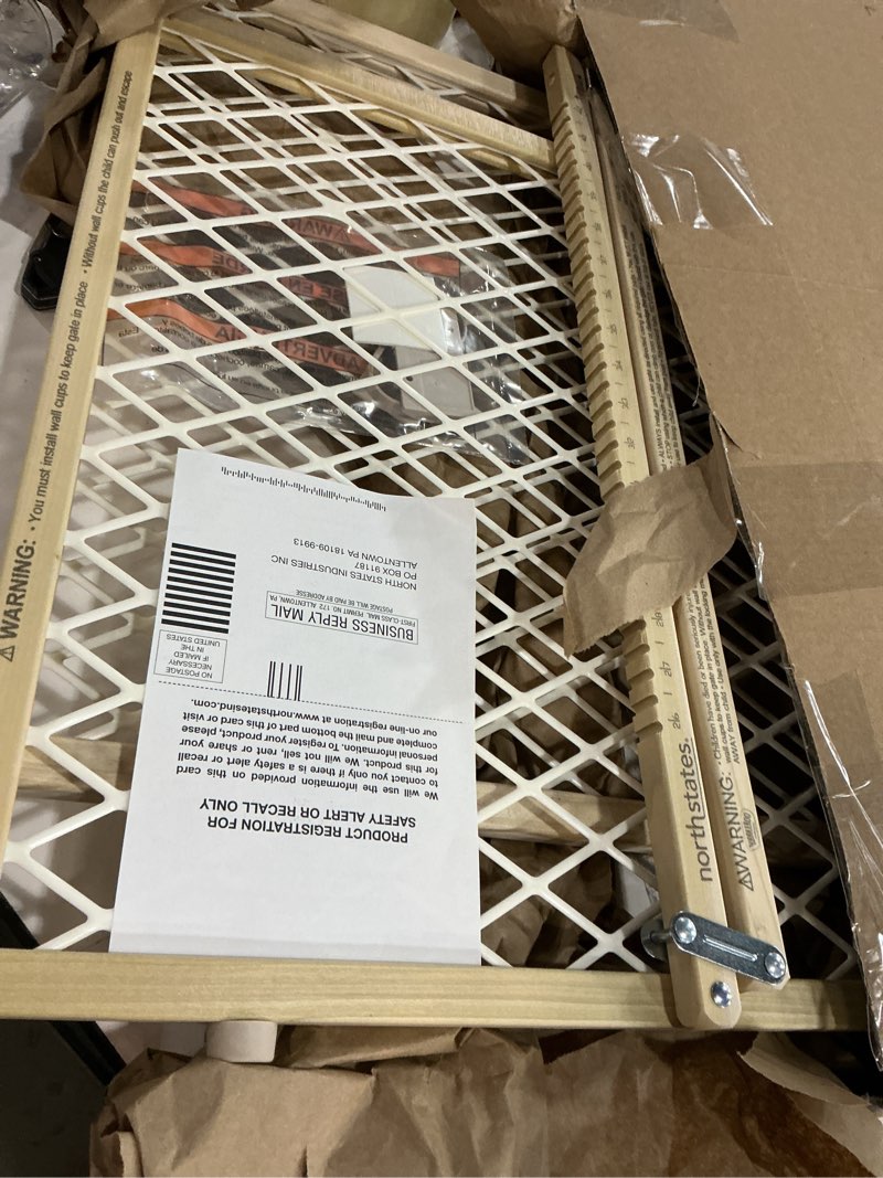 Condition photo showing As Is for Toddleroo by North States - Diamond Mesh Wooden Baby Gate: Pressure Mounted Baby Gate for Doorways - Adjustable 26.5 to 42 Inches Wide - 23 Inches Tall