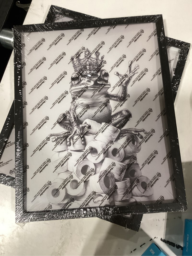 Condition photo showing New/Like New for Orvannaatr Bathroom Picture Wall Decor, Framed Black and White Bathroom Wall Art Wear Crown Frog Toilet Paper Pile - Playful Bathroom Wall Decor Animal Art Black and White be Hung Directly 14"L x 11"W Frog
