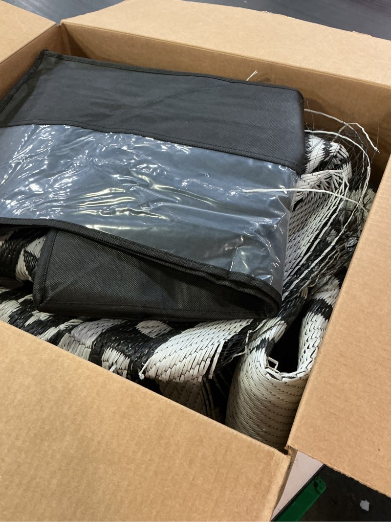 Condition photo showing As Is for olanly outdoor rug waterproof 9x12 ft, reversible outdoor plastic straw rug, boho patio rug, indoor outdoor carpet, rv mat outside for patio, camp, picnic, balcony, deck, backyard, black & white black & white 9' x 12' (rectangular)