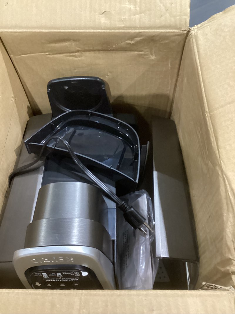 Condition photo showing As Is for keurig k-elite single serve k-cup pod coffee maker, with strength and temperature control, iced coffee capability, 8 to 12oz brew size, programmable, brushed slate