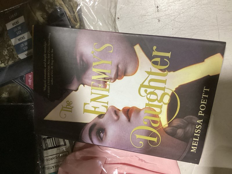 Condition photo showing Good Condition for the enemy's daughter - by melissa poett (hardcover)