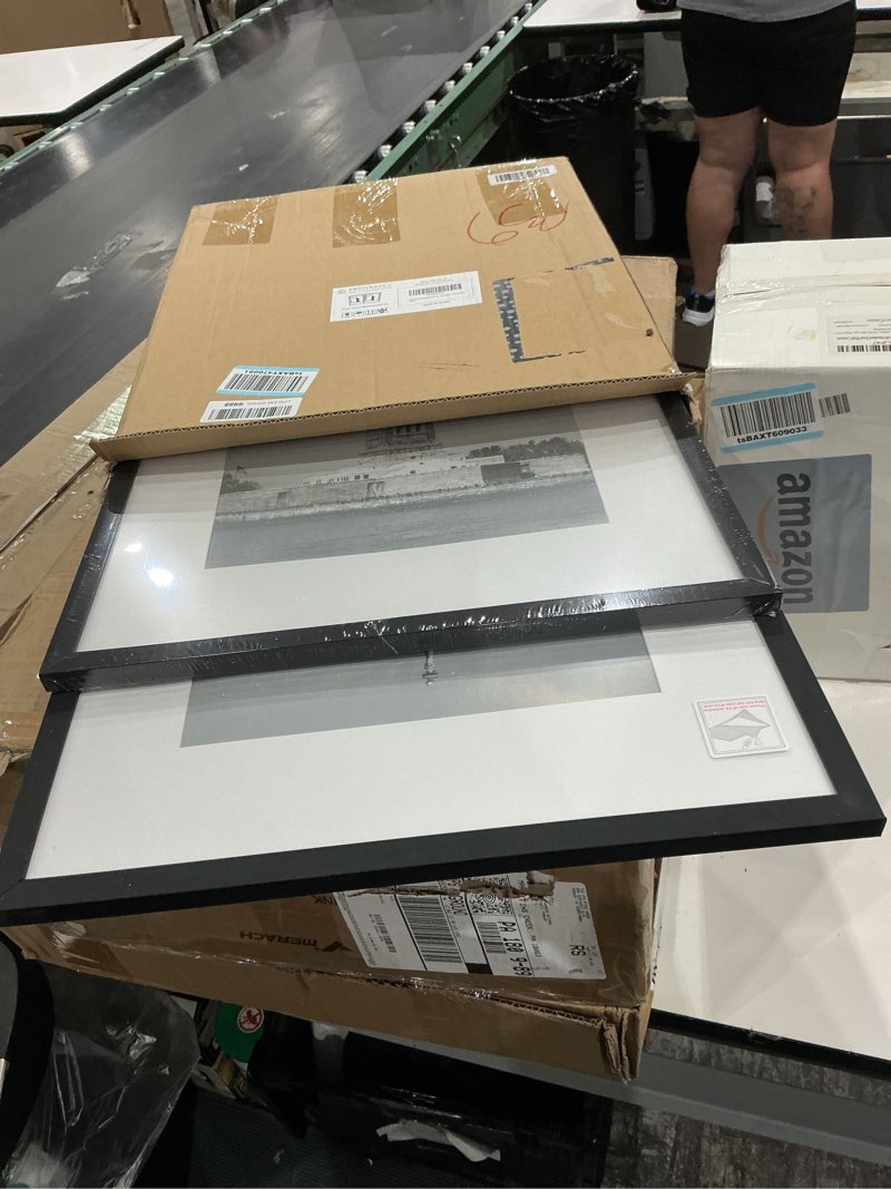 Condition photo showing Good Condition for enjoybasics 16x20 picture frame, display poster 11x14 with mat or 16 x 20 without mat, wall gallery photo frames, black, 2 pack black 16x20