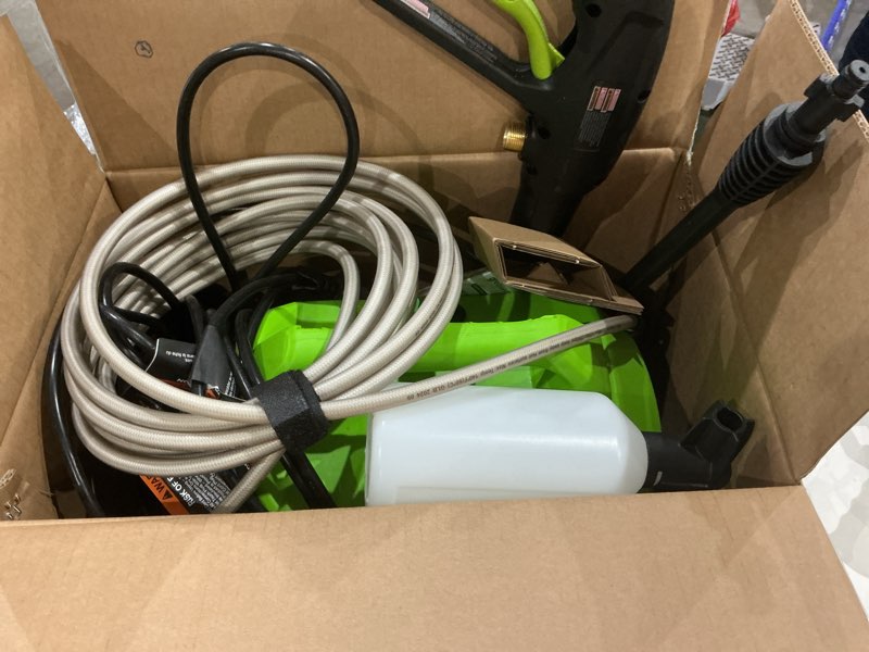 Condition photo showing As Is for greenworks 1800 psi 1.2-gpm cold water electric pressure washer with 2 spray tips