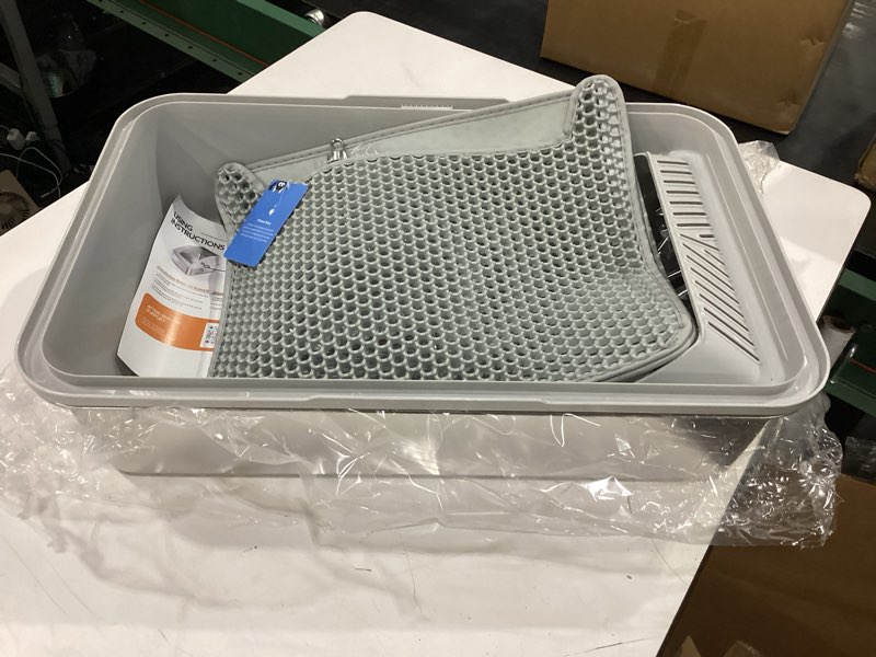 Condition photo showing New/Like New for stainless steel litter box | xl enclosed cat litter boxes with lid for big cats | high sided, anti-urine leakage | non-stick bottom & includes litter mat & metal scoop