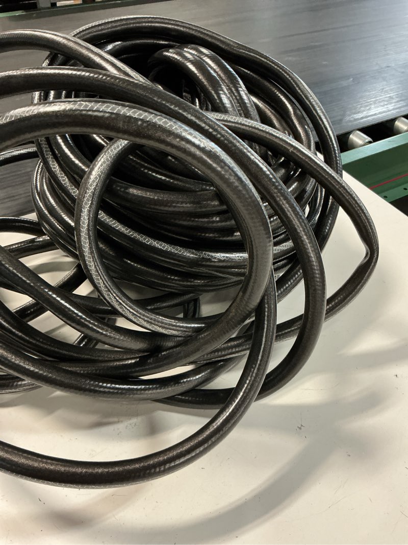Condition photo showing As Is for neverkink teknor apex 5/8-in x 100-ft heavy-duty kink free vinyl gray coiled hose