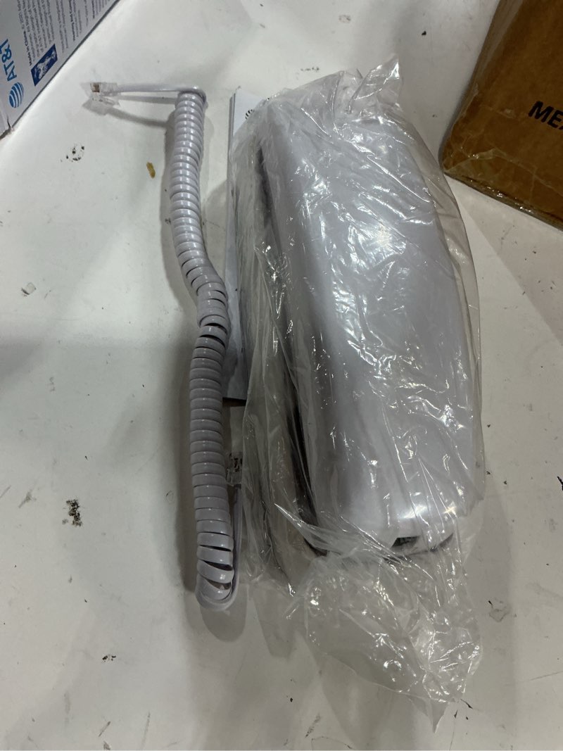 Condition photo showing New/Like New for at&t 210 basic trimline corded phone, no ac power required, wall-mountable, white white (pack of 1)