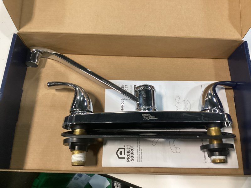 Condition photo showing As Is for project source dover chrome double handle deck-mount kitchen faucet (includes deck plate)
