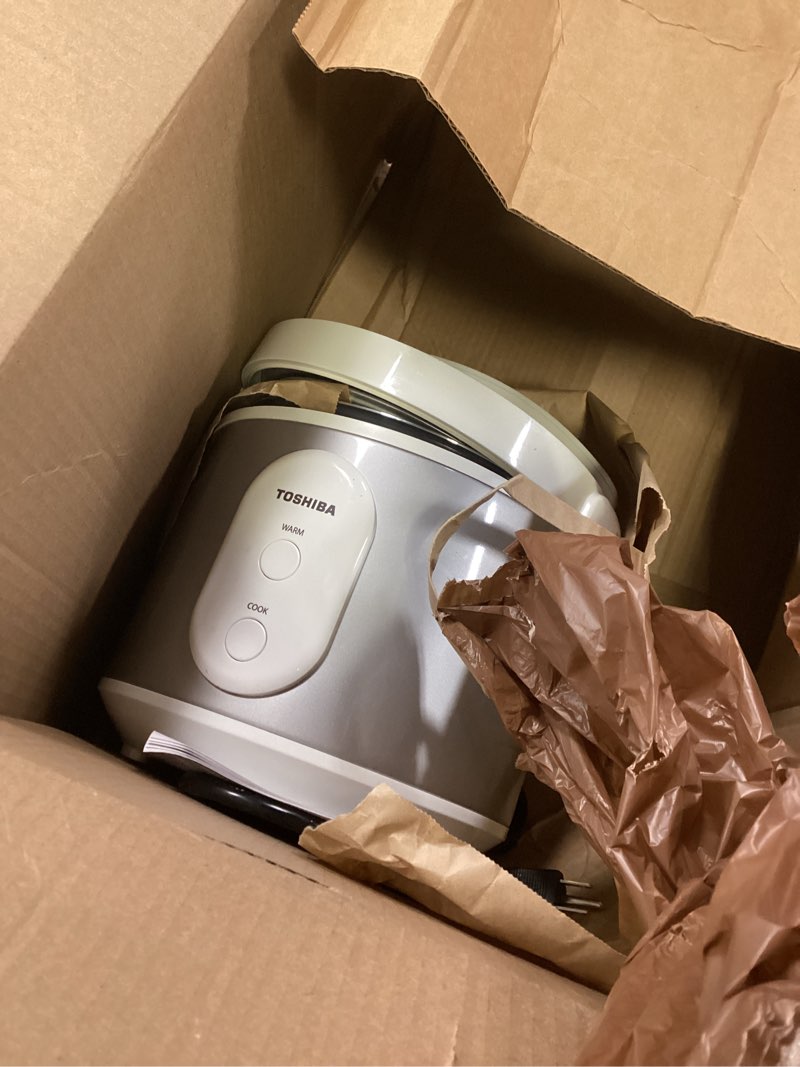 Condition photo showing Good Condition for toshiba rice cooker & steamer simple 5.5 cup(uncooked) with steaming basket, removable non-stick inner pot & inner lid, for soups, stews, grains&oatmeal, one touch&keep warm function, silvery white simple_5.5 cups