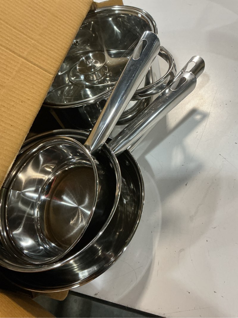 Condition photo showing As Is for mainstays stainless steel 10pc cookware set