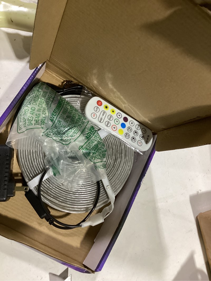 Condition photo showing As Is for 50ft outdoor led strip light waterproof,ip68 outside rgb+ic light strip with app/remote control,chase mode,music sync light for balcony,deck,rooftop,garden,pool 50ft-ip68 led strip lights