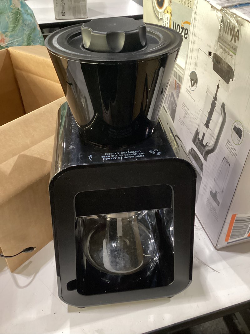 Condition photo showing Good Condition for used dash rapid cold brew maker with vacupress™ technology with glass carafe for 40 ounces of instant fresh cold brew coffee or iced tea black