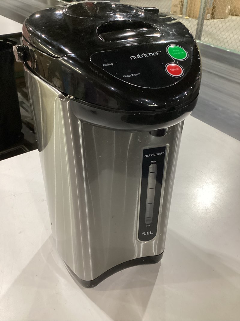Condition photo showing As Is for nutrichef 5.2 qt electric water kettle, portable, quick heating, 5 liter digital kettle with 5 temperature settings, safety lock, stainless steel, 3 dispensing options, 8.46" x 11.2" x 16.5" 5.3 quarts
