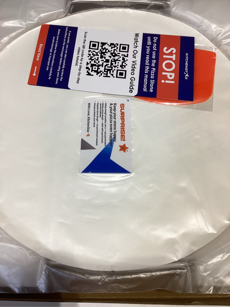 Condition photo showing Good Condition for kitchenstar 16-inch pizza stone for oven and bbq grill with handles, round, 5/8" thick - natural cordierite, 1800 °f resistant, baking stone set with stainless steel rack & plastic scraper tool 16 inch