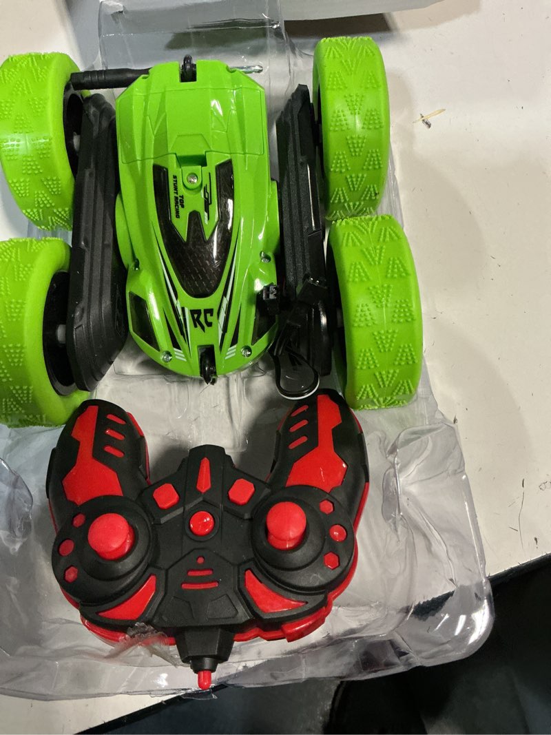 Condition photo showing New/Like New for aokesi remote control car  2.4ghz electric race stunt car  360 ° rotating double sided flip rc stunt car with led headlights  4wd off road drift rc r