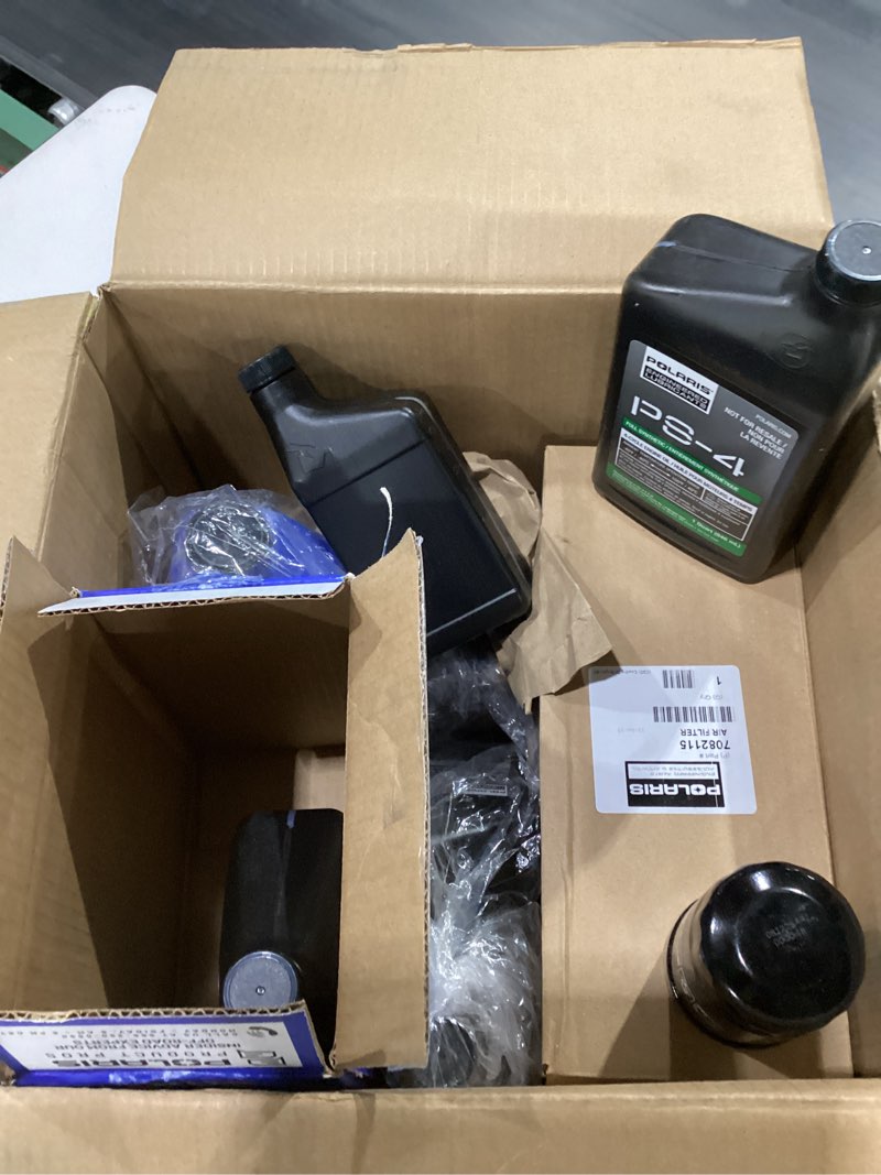 Condition photo showing As Is for polaris service kit for general 1000/xp 1000 or rzr trail s/s 1000 models, includes demand drive fluid, agl fluid, ps-4 5w-50 full synthetic oil, 1 air filter, 1 oil filter, 2 spark plugs - 2830544